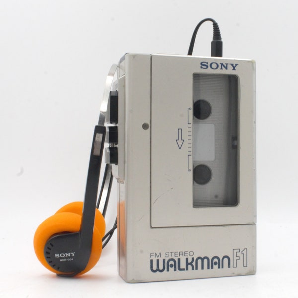 Vintage Sony Walkman F1 1980s personal stereo cassette tape player FM/AM radio metallic silver chrome with headphones refurbished VG Japan