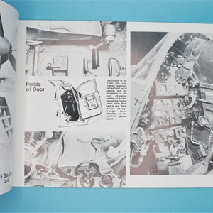 May include: A black and white photograph of the inside of an aircraft cockpit. The image shows the instrument panel, control panel, and the pilot's seat. The text "Inside of Door" is printed on the page.