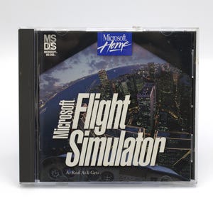 May include: A Microsoft Flight Simulator game case. The cover features a nighttime cityscape with the game title in large white letters. The Microsoft Home logo is visible. The case is in a clear plastic jewel case.