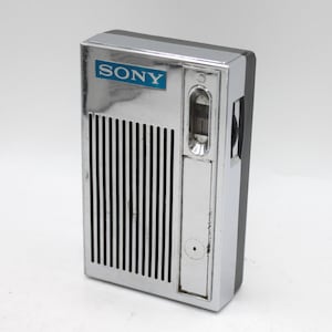 Vintage 1960s Sony transistor radio solid state AM receiver cool mod design chrome black case mono speaker earphone rare