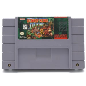 Vintage SNES Donkey Kong Country video game cartridge iconic side scrolling platformer 16-bit console Rare Nintendo 1995