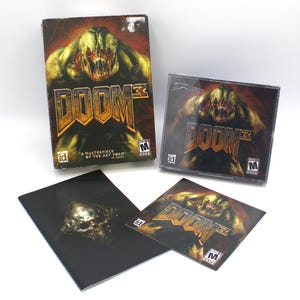 Vintage Doom 3 PC Game sealed in case with manual and guide iconic computer video game classic Activision id Software Games 2004