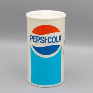 Vintage transistor radio Pepsi-Cola can AM receiver 1970s advertising red white and blue retro logo design serviced