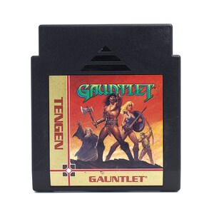 May include: A set of three ceramic mugs with a speckled, matte finish. The mugs are in shades of cream, light gray, and dark gray. Each mug has a simple, minimalist design, perfect for coffee or tea.