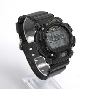Vintage 90s Casio digital watch G-Shock Illuminator LCD quartz dial time display chronograph stopwatch and alarm water/shock resistant case