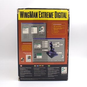 Puede incluir: Caja de joystick WingMan Extreme Digital negra y amarilla. La caja presenta im&aacute;genes del joystick y la interfaz del software, con el logotipo de Logitech. La caja tambi&eacute;n incluye los requisitos del sistema y un logotipo de CD-ROM.