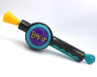 Vintage Bop-It 1990s command challenge fidget game electronic voice interactive twist pull bop Hasbro Toys 1996