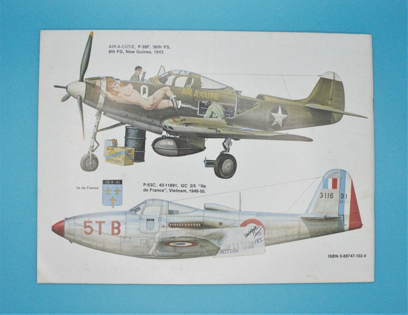 May include: A vintage illustration of two military aircraft. The top aircraft is a green and brown P-39F fighter plane with the words "Air-A-cutie" painted on the side. The bottom aircraft is a silver P-63C fighter plane with the words "5TB" painted on the side. Both aircraft have French markings.