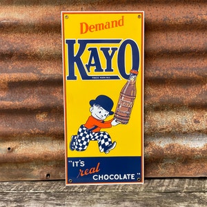 Vintage Kayo Chocolate Milk Porcelain Sign 1990s Era Reproduction Porcelain Enamel Metal Collectible Sign 8x17 1/4 Inch