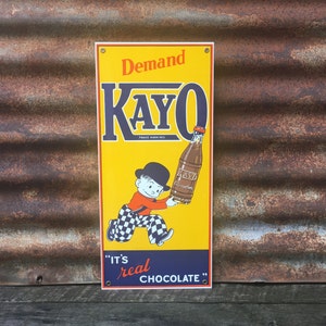 Vintage Kayo Chocolate Milk Porcelain Sign 1990s Era Reproduction Porcelain Enamel Metal Collectible Sign 8x17 1/4 Inch
