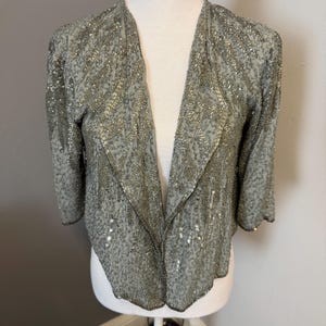 Vintage New look silver sequin scalped bolero jacket