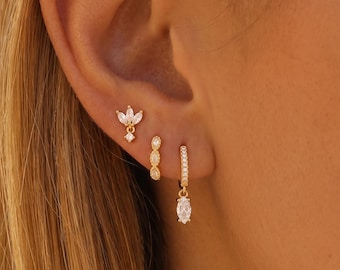 Set di orecchini pendenti impermeabili e delicati placcati in oro, orecchini a cerchio con zirconi cubici a marquise, orecchini a perno a forma di fiore, orecchini da indossare tutti i giorni.