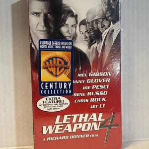 May include: A VHS tape of the movie Lethal Weapon 4, featuring a red cover with a black and white cast photo. Text includes The Gang's All Here, Warner Home Video Century Collection, and the names Mel Gibson, Danny Glover, Joe Pesci, Rene Russo, Chris Rock, and Jet Li.