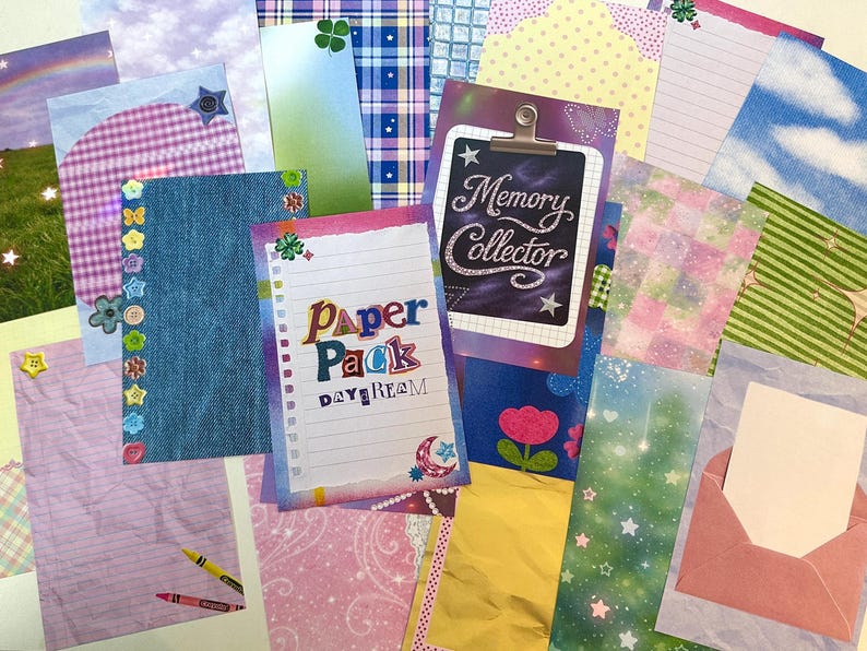 May include: A collection of decorative paper sheets with various patterns and designs. Includes lined paper, denim-textured paper, and paper with floral and star motifs. One sheet has the text "Paper Pack Daydream" and another says "Memory Collector".