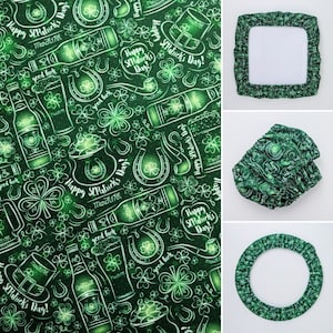 May include: Green St. Patrick's Day fabric featuring white illustrations of beer bottles, shamrocks, horseshoes, and text. The image shows the fabric and three items made from it: a square cover, a pair of covers, and a round cover.