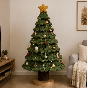 May include: A large, cone-shaped, crocheted Christmas tree in dark green yarn, featuring a textured, scalloped-edge design. The tree is topped with a yellow crocheted star and decorated with small, round, multi-colored ornaments and candy canes.