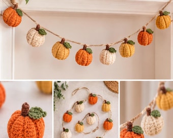 May include: A decorative garland featuring multiple crocheted pumpkins in shades of orange, yellow, and cream. Each pumpkin has a brown stem and a small green leaf, all strung together on a natural-coloured twine cord for hanging display.