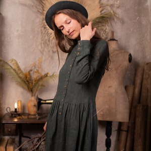 Linen dress called the 'Victoria Dress' in the 'Mystic Forest' color, which is made by KnockKnockLinen.