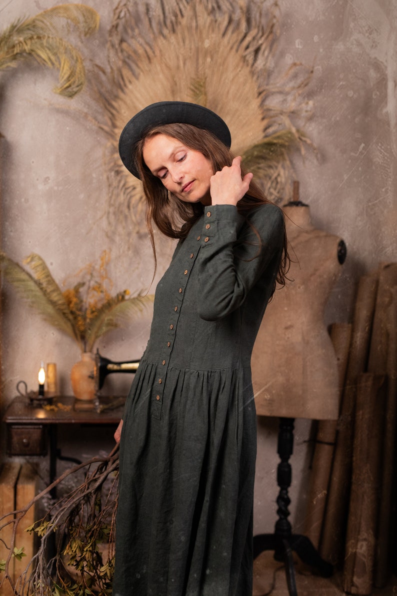 Linen dress called the 'Victoria Dress' in the 'Mystic Forest' color, which is made by KnockKnockLinen.