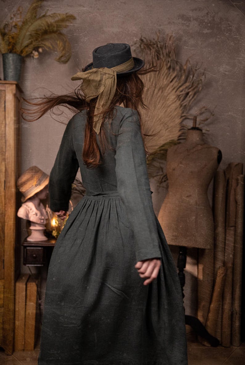 A romantic linen wrap dress with long sleeves and a flowing skirt, featuring pockets for practicality. Soft, breathable, and perfect for a cottage-inspired summer look. Handmade elegance.