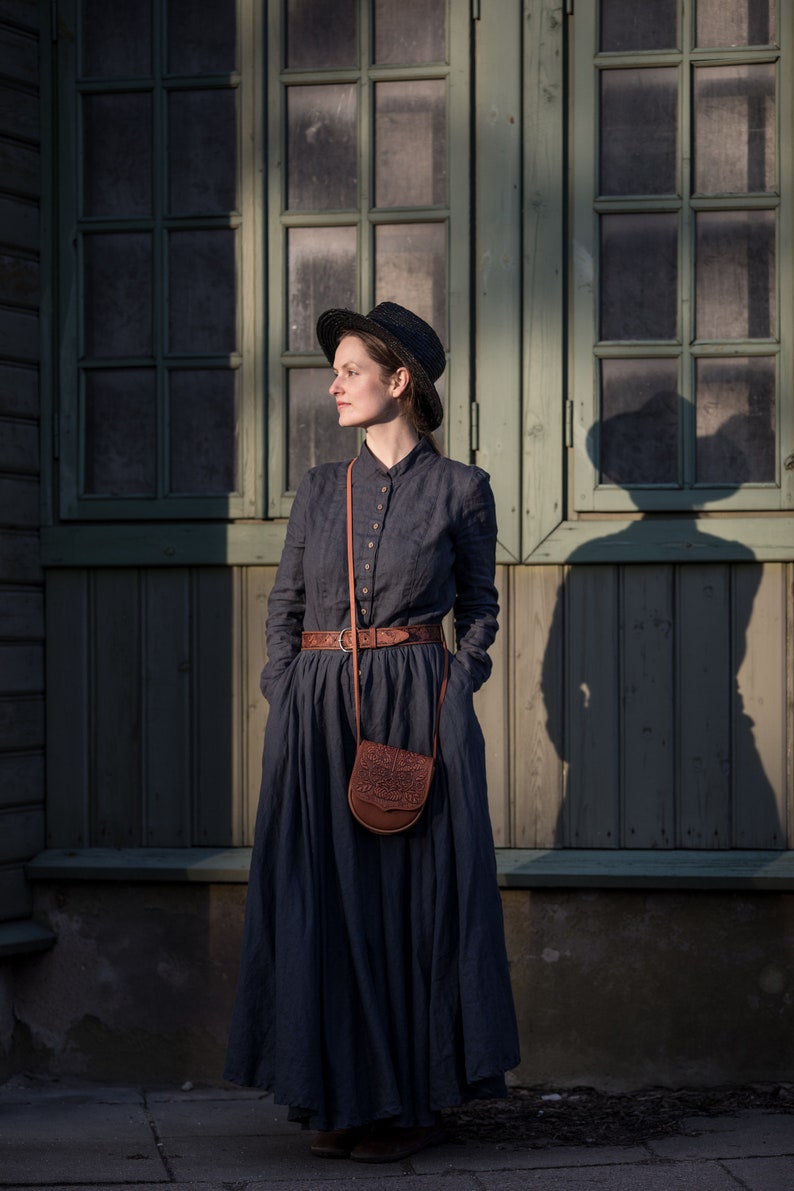 linen dress called the 'Victoria Dress' in the 'Mystic Forest' color, which is made by KnockKnockLinen.