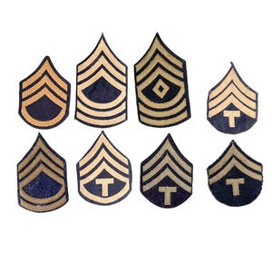 Vintage 1940-talsparti med 8 original Chevron-märken från andra världskriget, amerikansk armé