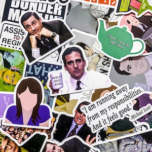May include: A selection of stickers featuring characters and quotes from the TV show "The Office." Stickers include images of Michael Scott, a green teapot, and the phrase "World's Best Boss."