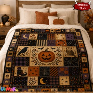 May include: A patchwork quilt featuring a central jack-o'-lantern surrounded by Halloween motifs including black cats, owls, ravens, ghosts, spiderwebs, moons, stars, and floral patterns in a colour palette of orange, black, purple, and cream.