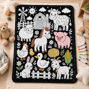 May include: A rectangular black rug featuring a white line art pattern of a farm scene. The design includes a barn, windmill, sun, clouds, flowers, and various animals such as a cow, sheep, horse, pig, chicken, chick, rabbit, duck, and goat.