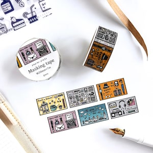 May include: A roll of masking tape with the text "Masking tape" and illustrations of a typewriter, pen, and envelope. The tape is 20mm wide and 7m long. Also shown are decorative stickers with various illustrations.