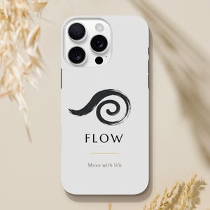 May include: A white smartphone case featuring a black brushstroke spiral graphic above the word FLOW in a serif font, followed by a thin horizontal line and the text Move with life in a smaller, lighter font, with a triple camera cutout.