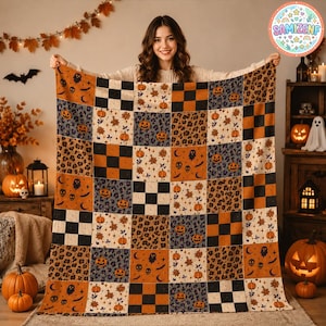 May include: A rectangular throw blanket featuring a patchwork design of alternating squares. The pattern includes black and orange checkerboards, leopard print, and cream-colored squares decorated with orange pumpkins, ghosts, and black bats.