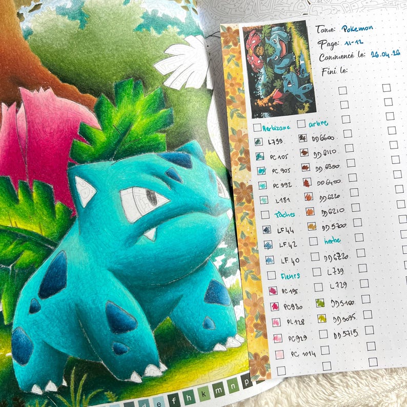 May include: A teal-colored Bulbasaur illustration from the Pokemon series, set against a backdrop of green foliage and pink flowers. The image is part of a journal page with handwritten notes and a small illustration of other Pokemon.