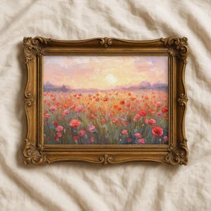 Puede incluir: Pintura enmarcada en un marco dorado ornamentado, que representa un campo de amapolas rojas al atardecer. La obra de arte utiliza una paleta cálida de rosas, naranjas y amarillos, creando una escena acogedora.