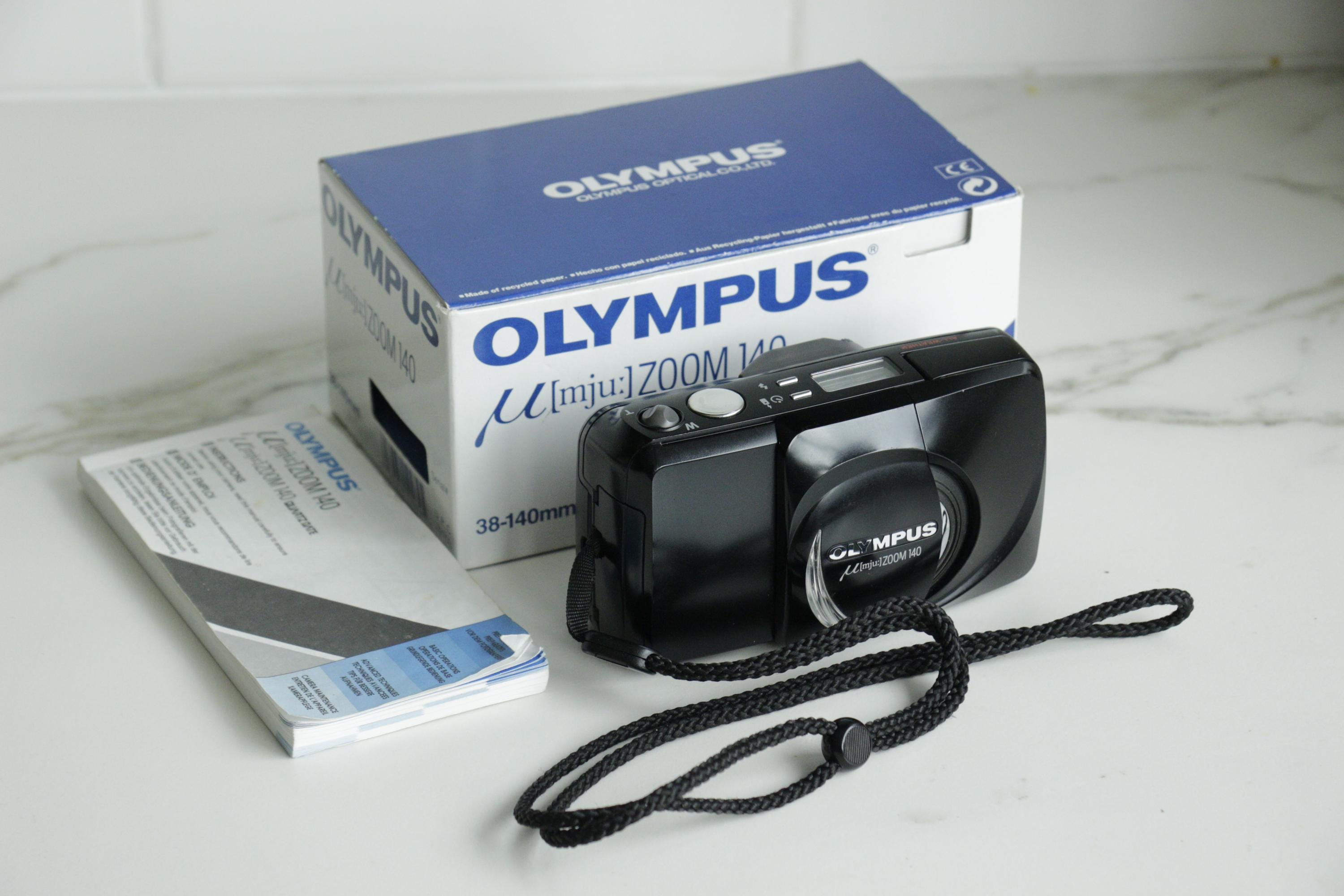 Olympus µ [mju:] Zoom 140 38-140mm Point & Shoot Film Camera