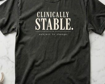 Funny Nurse Shirt Clinically Stable Subject to Change, ICU RN Gift for Nurses, Burnout Humor Tee, Healthcare Worker Shirt