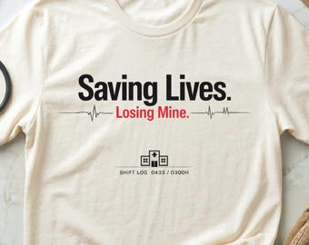 Funny Nurse Shirt “Saving Lives Losing Mine”, RN Gift for Nurses, Burnout Humor Tee, Healthcare Worker Shirt