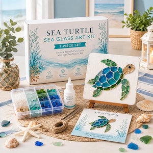 May include: A sea turtle sea glass art kit featuring a white box with blue text, a clear plastic organizer filled with blue, green, and white sea glass, a bottle of adhesive, a wooden easel with a sea turtle mosaic, and a step-by-step guide.