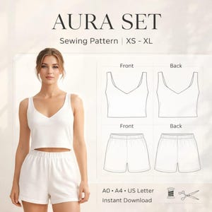 May include: White Aura Set sewing pattern, featuring a V-neck tank top and shorts. The image shows a woman wearing the set, with diagrams of the front and back views. Text on the image reads "AURA SET" and "Sewing Pattern XS - XL".