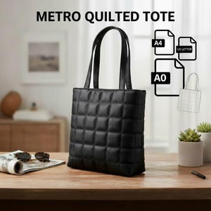 May include: A black quilted tote bag with a square pattern and two handles. The bag is on a wooden table with a magazine and sunglasses. The text "METRO QUILTED TOTE" is at the top. Document size icons are also visible.
