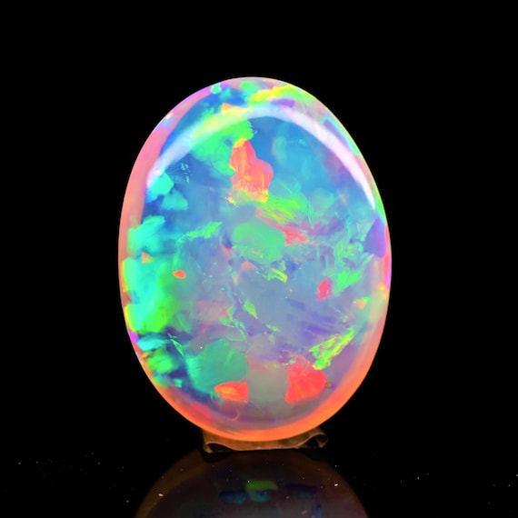 Natural White Ethiopian Opal Cabochon, Rainbow Fire, 16.05 Carat (22x16x8 MM)