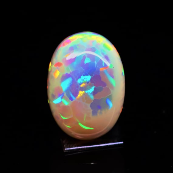Natural Ethiopian Opal Cabochon, Oval Rainbow Fire Gemstone (22.80 Carat)