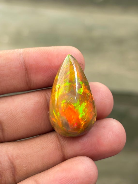 34.50 Carat, Natural Rainbow Fire Cabochon Ethiopian Black Welo Opal Collector Grade Loose Gemstone, 30x18x13 mm, Jewelry Making Gemstone.