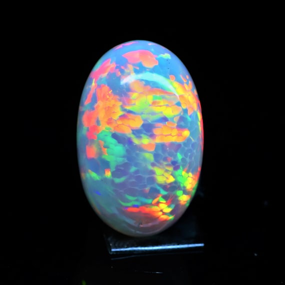 Natural Ethiopian Opal Cabochon, 21.80 Carat, Oval Rainbow Fire Gemstone