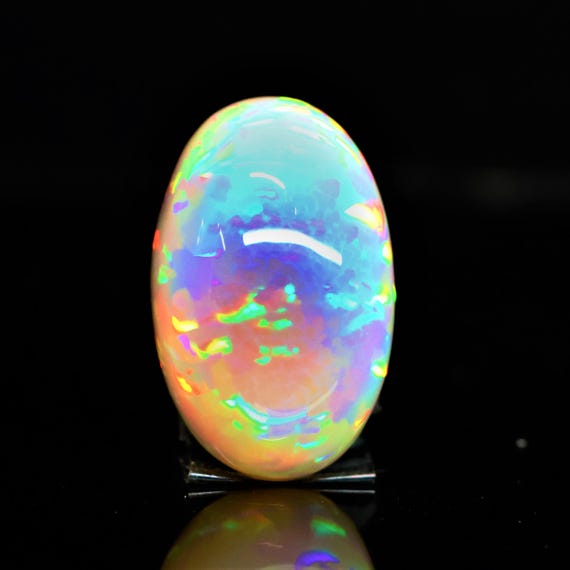 Natural White Ethiopian Opal Cabochon, 30.25 Carat, Oval Rainbow Fire Gemstone