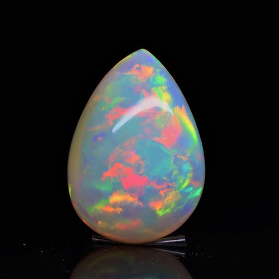 Natural Ethiopian Opal Cabochon, 30.85 Carat Pear Shape, Rainbow Fire Gemstone