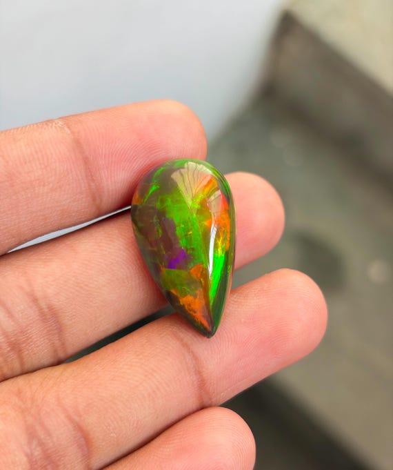 24.55 Carat, Natural Rainbow Fire Cabochon Ethiopian Black Welo Opal Collector Grade Loose Gemstone, 28x16x12 mm, Jewelry Making Gemstone.