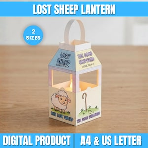 Może przedstawiać: Papierowy lampion z ilustracjami owcy i laski pasterskiej oraz napisem Lost Sheep, The Good Shepherd i Luke 15:4-7. Lampion posiada uchwyt, wycięte okienka i światło wewnątrz, z widoczną etykietą 2 Sizes.