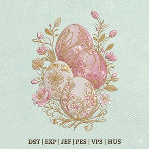 May include: Embroidered Easter egg design featuring three eggs in shades of pink and cream, adorned with floral patterns and gold accents. The design includes pink flowers and gold leaves, set against a light teal background. The bottom of the image displays the text: DST | EXP | JEF | PES | VP3 | HUS.