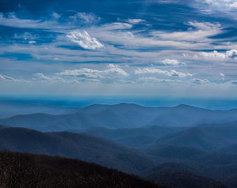Dramatic Cloudscape Over Mountain Ranges